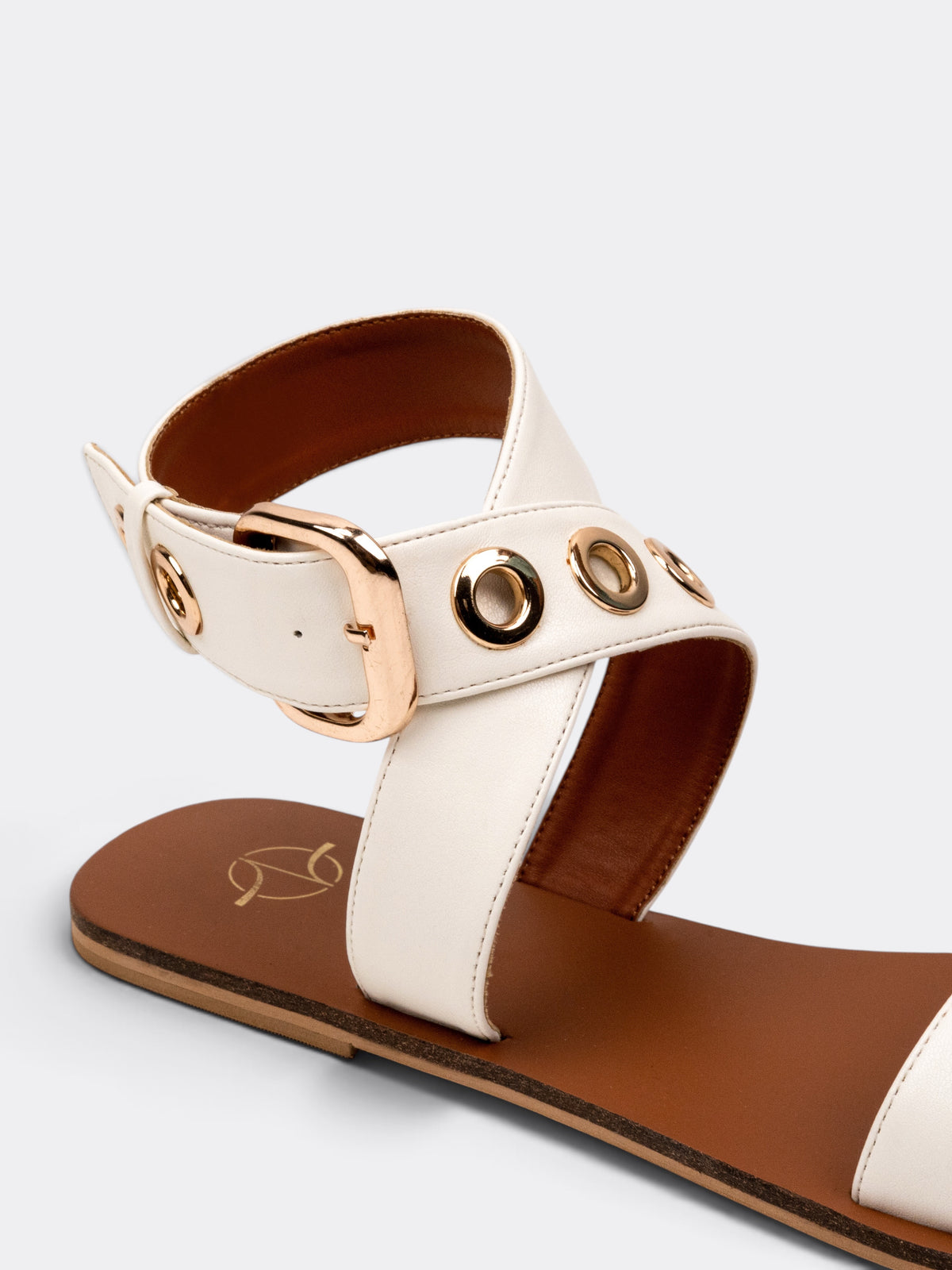 CHLLEN Women Tan Cross-Strap Sandals with Gold-Tone Eyelet Detail