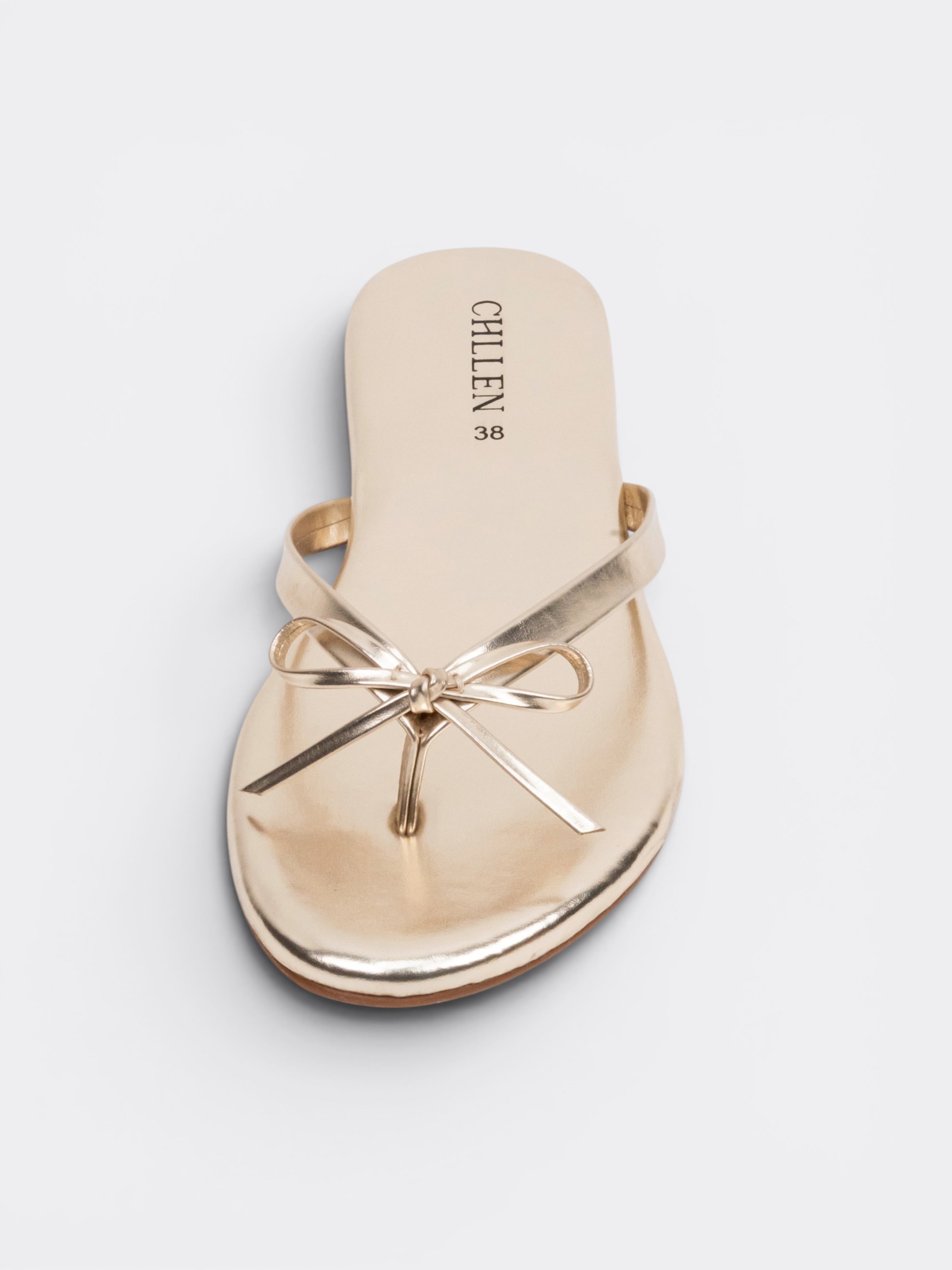 CHLLEN Aurora Bow Metallic Toe Ring Flats – Champagne Gold