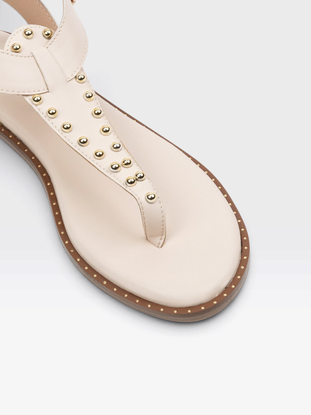 CHLLEN Ivory Flat Sandals with Gold-Tone Stud Accents and Toe-Loop Design