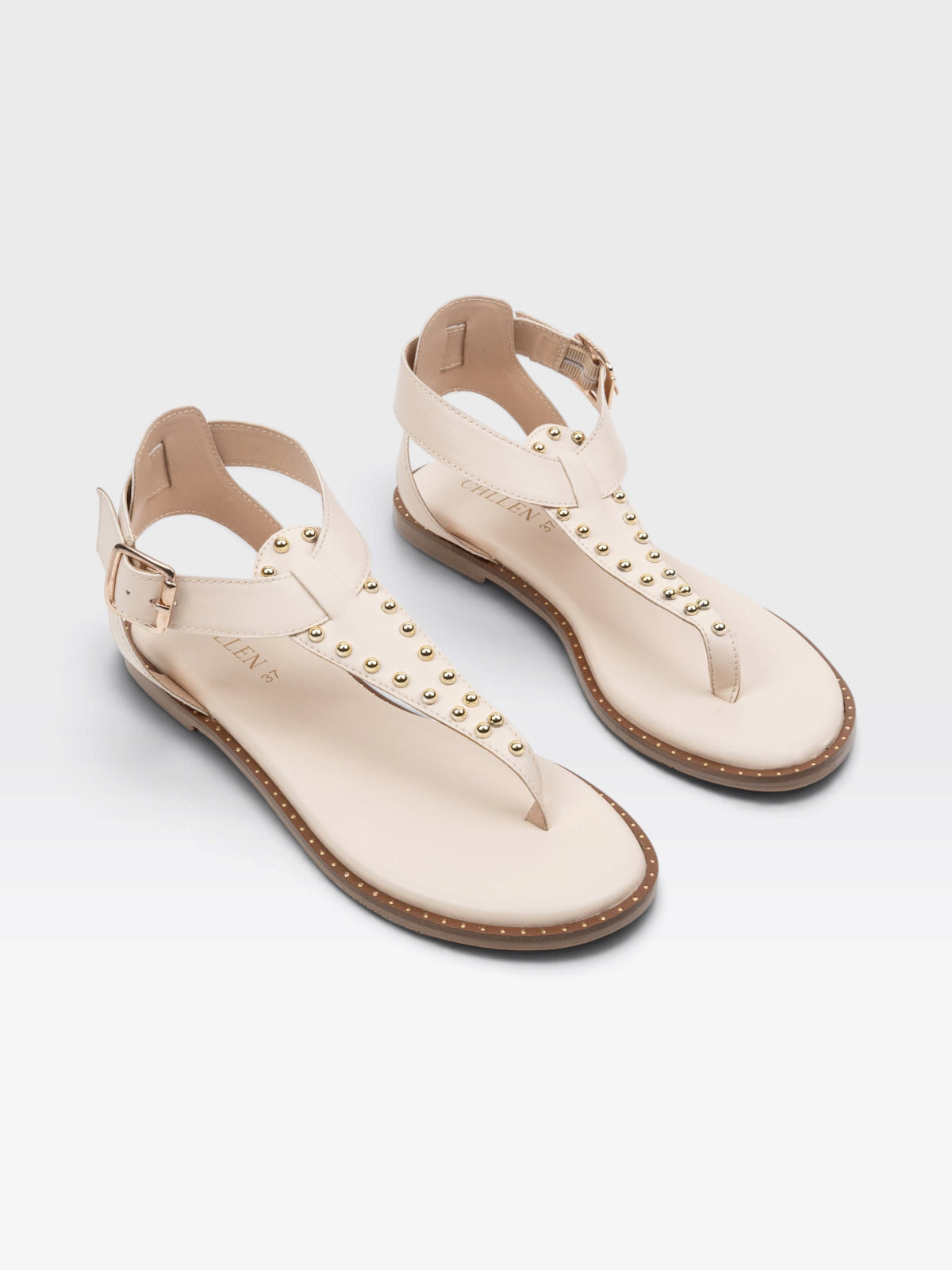 CHLLEN Ivory Flat Sandals with Gold-Tone Stud Accents and Toe-Loop Design