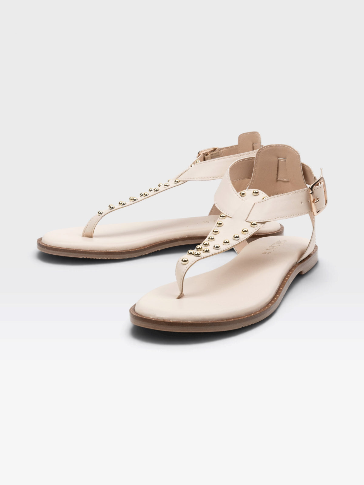CHLLEN Ivory Flat Sandals with Gold-Tone Stud Accents and Toe-Loop Design