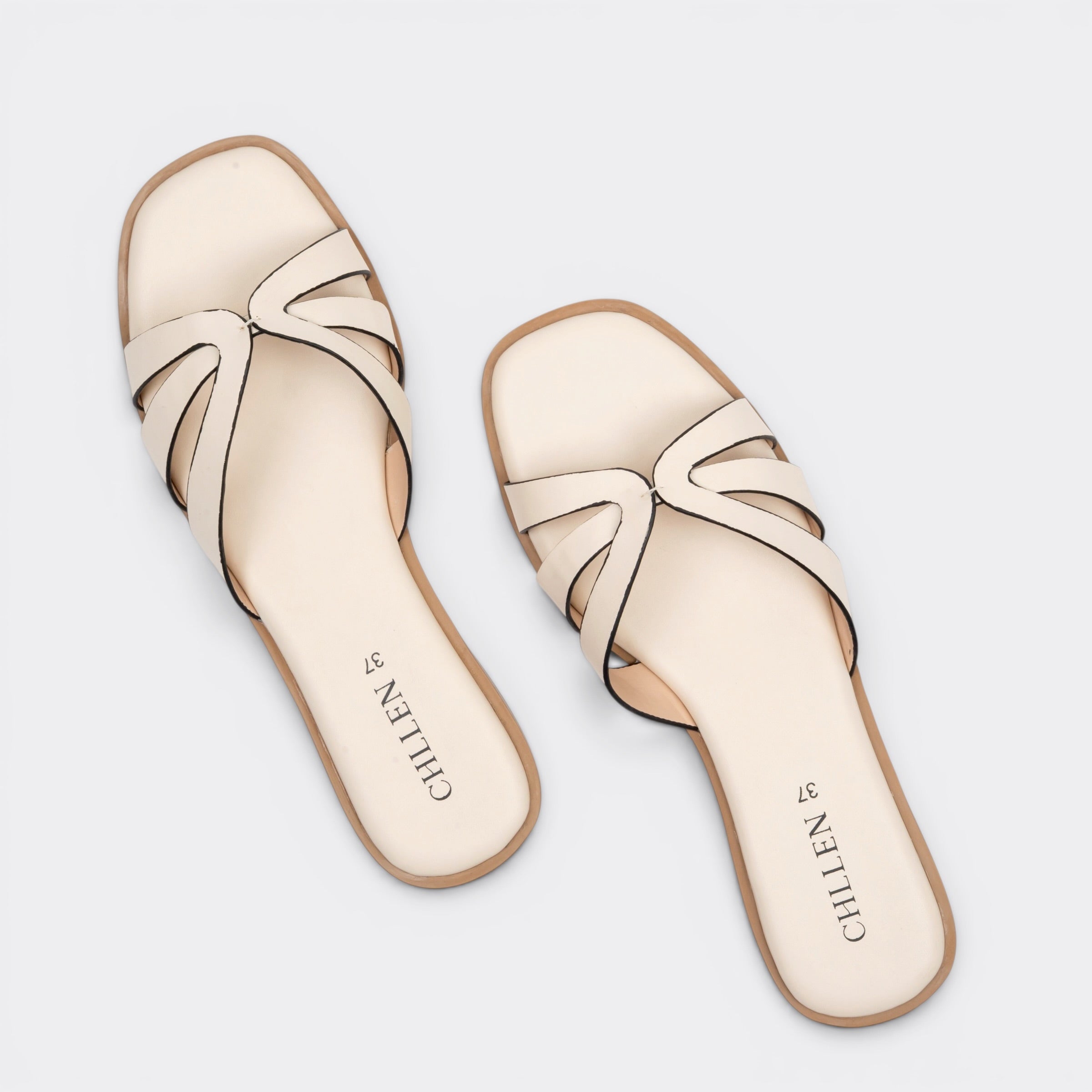 CHLLEN Ivory Cross Strap Flats